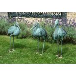 Three bronze alloy garden models of storks, circa 2000, modeled as standing Three bronze alloy