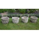 A set of four stone composition garden planters, modern A set of four stone composition garden