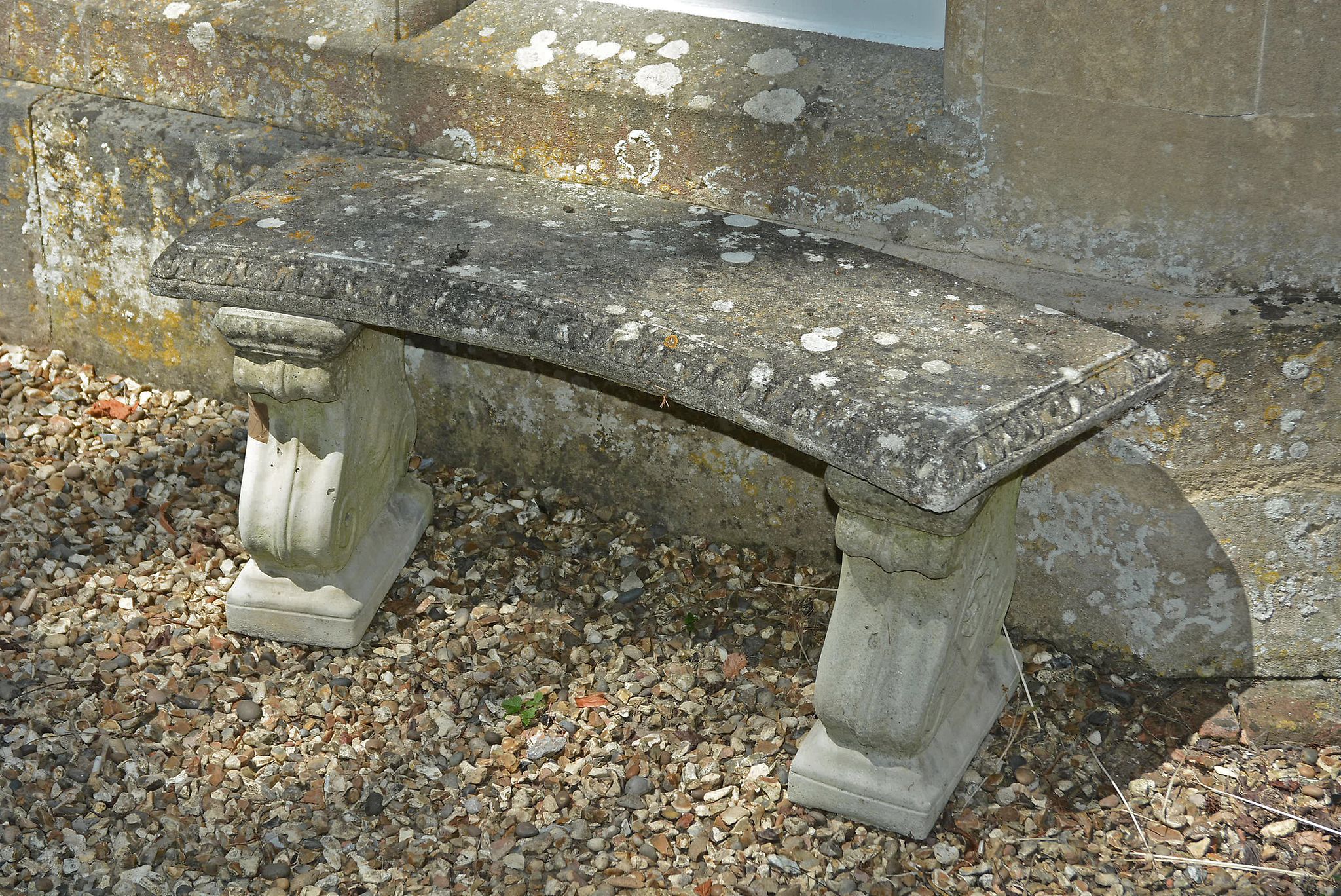 A set of four stone composition garden exedra seats, 20th century A set of four stone composition