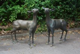 A pair of bronze alloy garden models of a buck and a doe, circa 2000 A pair of bronze alloy garden