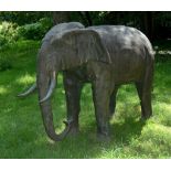 A large bronze alloy garden model of an elephant, circa 2000 A large bronze alloy garden model of an