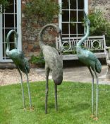 A group of three bronze alloy garden models of storks, circa 2000 A group of three bronze alloy