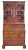 A George III mahogany bureau bookcase , second half 18th century, the astragal doors enclosing