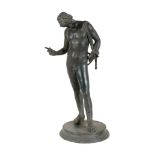 A Neapolitan patinated bronze model of Narcissus, cast after the Antique, late 19th century, almost