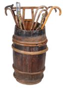 A coopered barrel stick stand , late 19th/ early 20th century, 65cm high, 34cm diameter, together