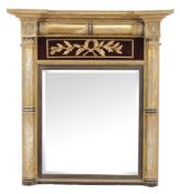 A William IV gilt and ebonised overmantel mirror, circa 1835, with velvet panel, 97cm high, 89cm