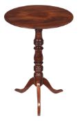 A Regency mahogany tripod table, circa 1815, 74cm high, the top 52cm diameter