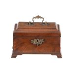 A George II mahogany tea caddy, mid 18th century, the hinged and cavetto edged cover with foliate