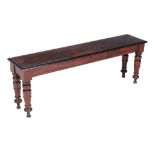 A Victorian mahogany and parcel ebonised hall bench or window seat , circa 1880, 47cm high, 137cm