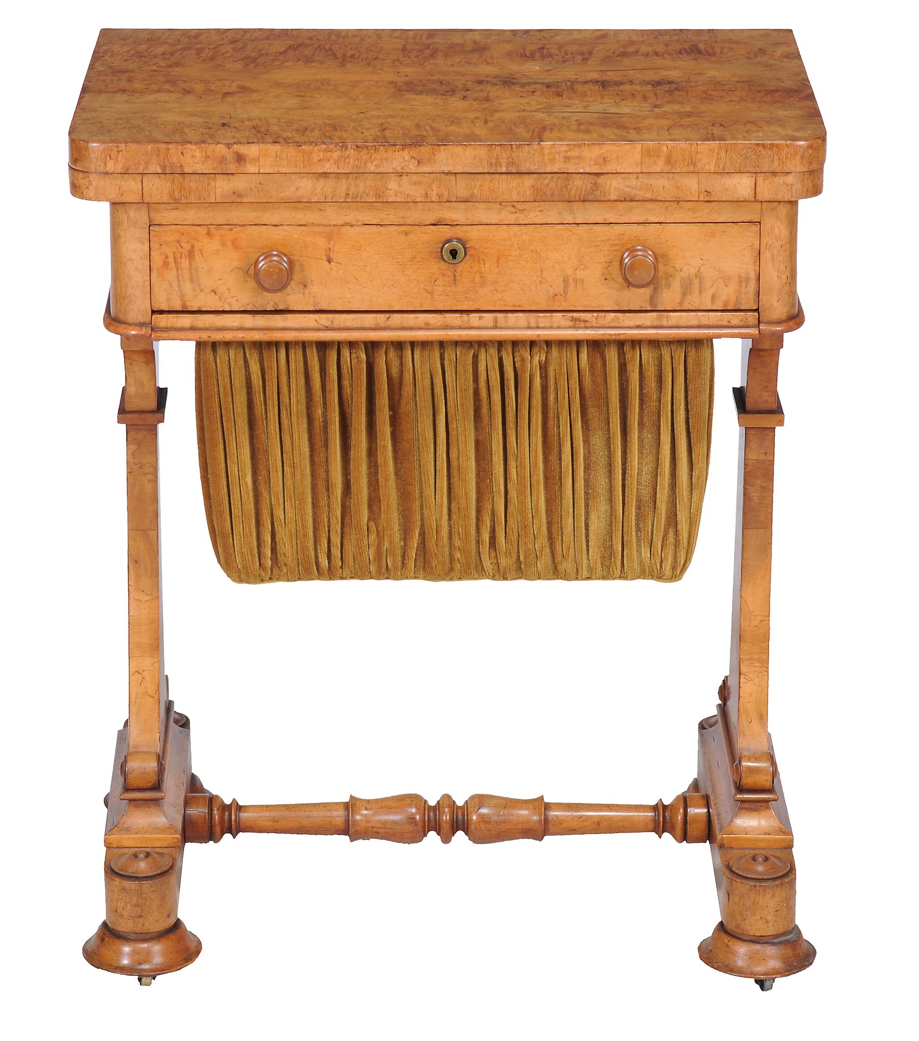 A Victorian maple work table , circa 1860, the top opening and revolving, above single frieze