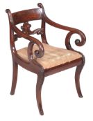 Ω A Regency mahogany armchair, circa 1820, in the manner of Gillows, the bar back inset rosewood