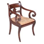 Ω A Regency mahogany armchair, circa 1820, in the manner of Gillows, the bar back inset rosewood