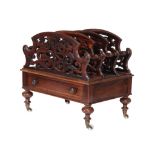 Ω A Victorian rosewood Canterbury , circa 1870, with pierced dividers, 52cm high, 56cm wide, 41cm