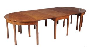 A George III mahogany D-end dining table , late 18th century, with central section and four