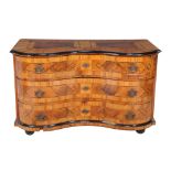A South German walnut and strung commode , second half 18th century, of serpentine outline and
