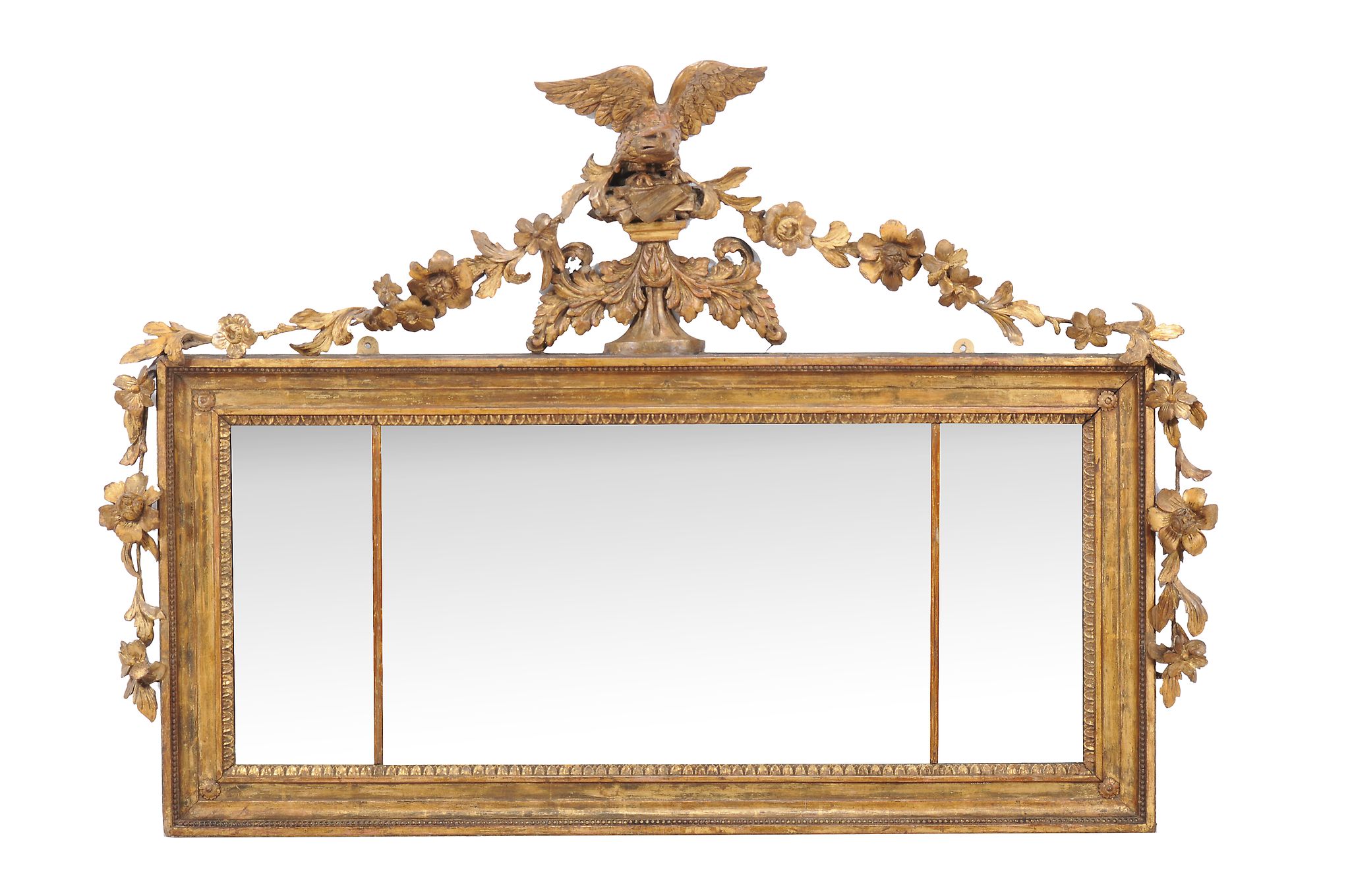 A giltwood and composition triptych wall mirror , late 19th century, with eagle surmount flanked by