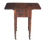 Ω A Regency rosewood drop-leaf work table, circa 1815 in the manner of Gillows, the book-matched top