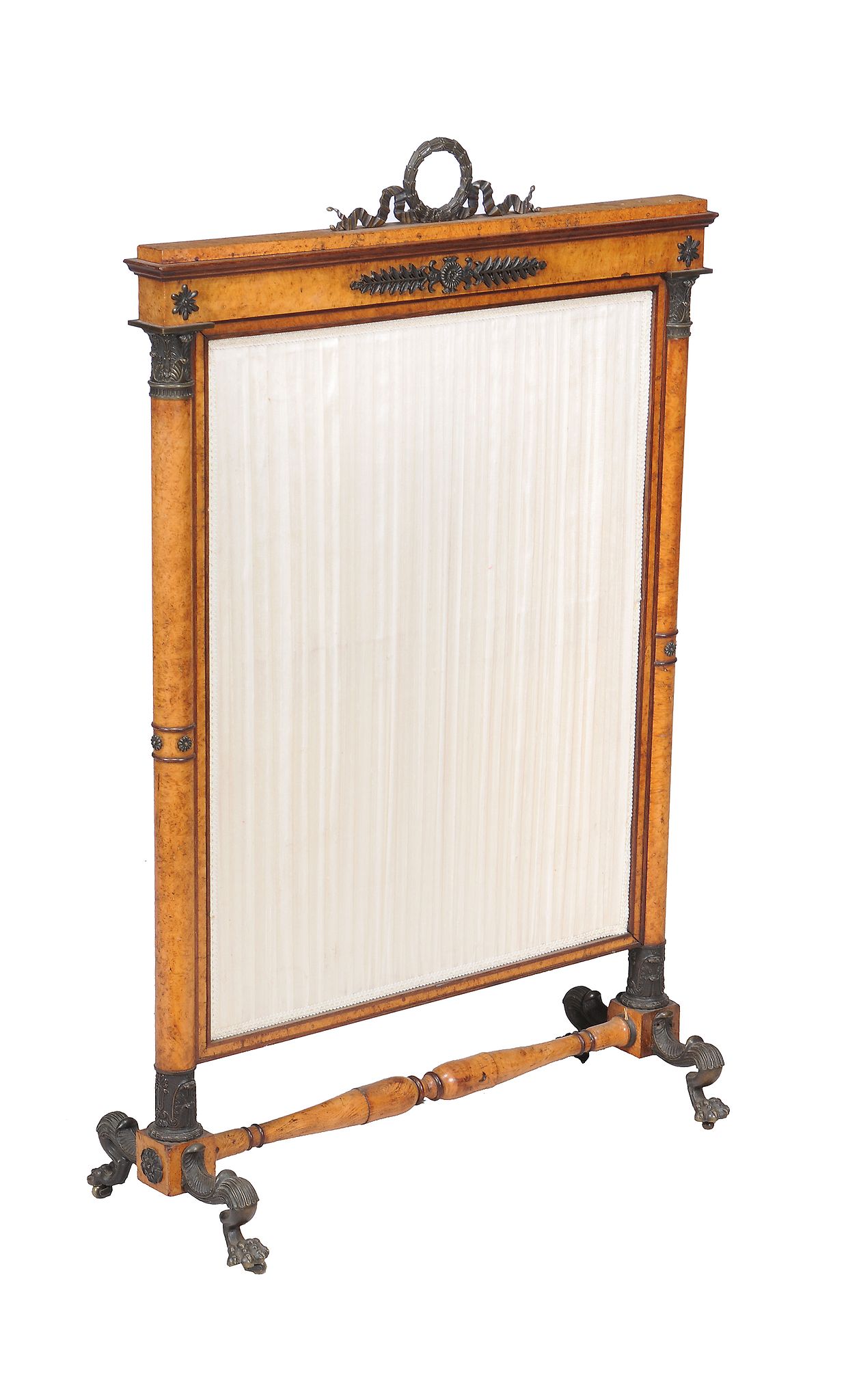 A Regency karelian birch and bronze mounted fire screen, circa 1815, the pleated screen flanked by