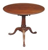 A George III mahogany occasional table , with birdcage action, 71cm high, the top approximately
