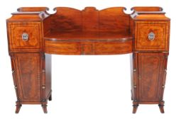 Ω A Scottish Regency mahogany and rosewood inlaid pedestal sideboard , circa 1820, 125cm high, 184cm