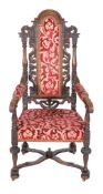 A carved oak and upholstered armchair in Louis XIV style , 20th century, 132cm high, 60cm wide,