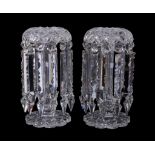A pair of clear cut-glass candlestick table lustres, third quarter 19th century, the petal-shaped