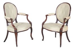 A pair of George III mahogany open armchairs , in French Hepplewhite style