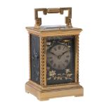 A French gilt brass and oxidised electrotype carriage clock, retailed by Army and Navy, Paris, late