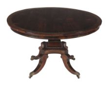 Ω A Regency rosewood and brass marquetry circular centre table , circa 1815, in the manner of