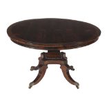 Ω A Regency rosewood and brass marquetry circular centre table , circa 1815, in the manner of