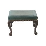 A George II mahogany foot stool, probably Irish, mid 18th century and later, with cabriole legs and