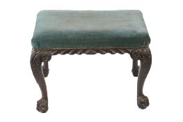 A George II mahogany foot stool, probably Irish, mid 18th century and later, with cabriole legs and