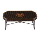 A simulated rosewood and parcel gilt coffee table in Regency style , last quarter 20th century, the