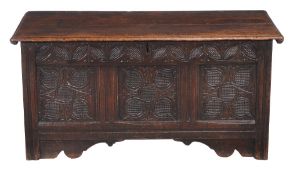A carved oak coffer , possibly West Country, late 17th century, with internal candlebox, 59cm high,