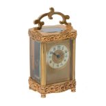 A French brass carriage timepiece, circa 1900, the eight-day movement with platform cylinder