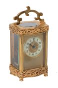 A French brass carriage timepiece, circa 1900, the eight-day movement with platform cylinder