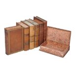 A small collection of oversize false book bindings, 20th century, hinged to open as boxes, the