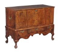 A George II walnut mule chest , circa 1740, the upper section with a hinged lid, the lower section