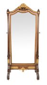 A French walnut and parcel gilt cheval mirror, early 20th century, in the early 19th century taste,