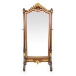 A French walnut and parcel gilt cheval mirror, early 20th century, in the early 19th century taste,