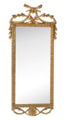 A carved giltwood wall mirror , circa 1800 with torches and festoon surmounting the rectangular