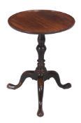 A George III mahogany tripod table or kettle stand, circa 1760, 59cm high, the top 46cm diameter