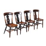A set of four Victorian Windsor kitchen chairs , second half 19th century, each with elm chair,