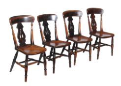 A set of four Victorian Windsor kitchen chairs , second half 19th century, each with elm chair,