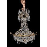 A Continental, probably Scandinavian gilt metal and glass hung six light chandelier, second quarter