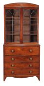 A George III mahogany and parquetry banded secretaire bookcase , circa 1800, the fall front