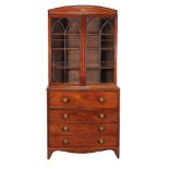 A George III mahogany and parquetry banded secretaire bookcase , circa 1800, the fall front