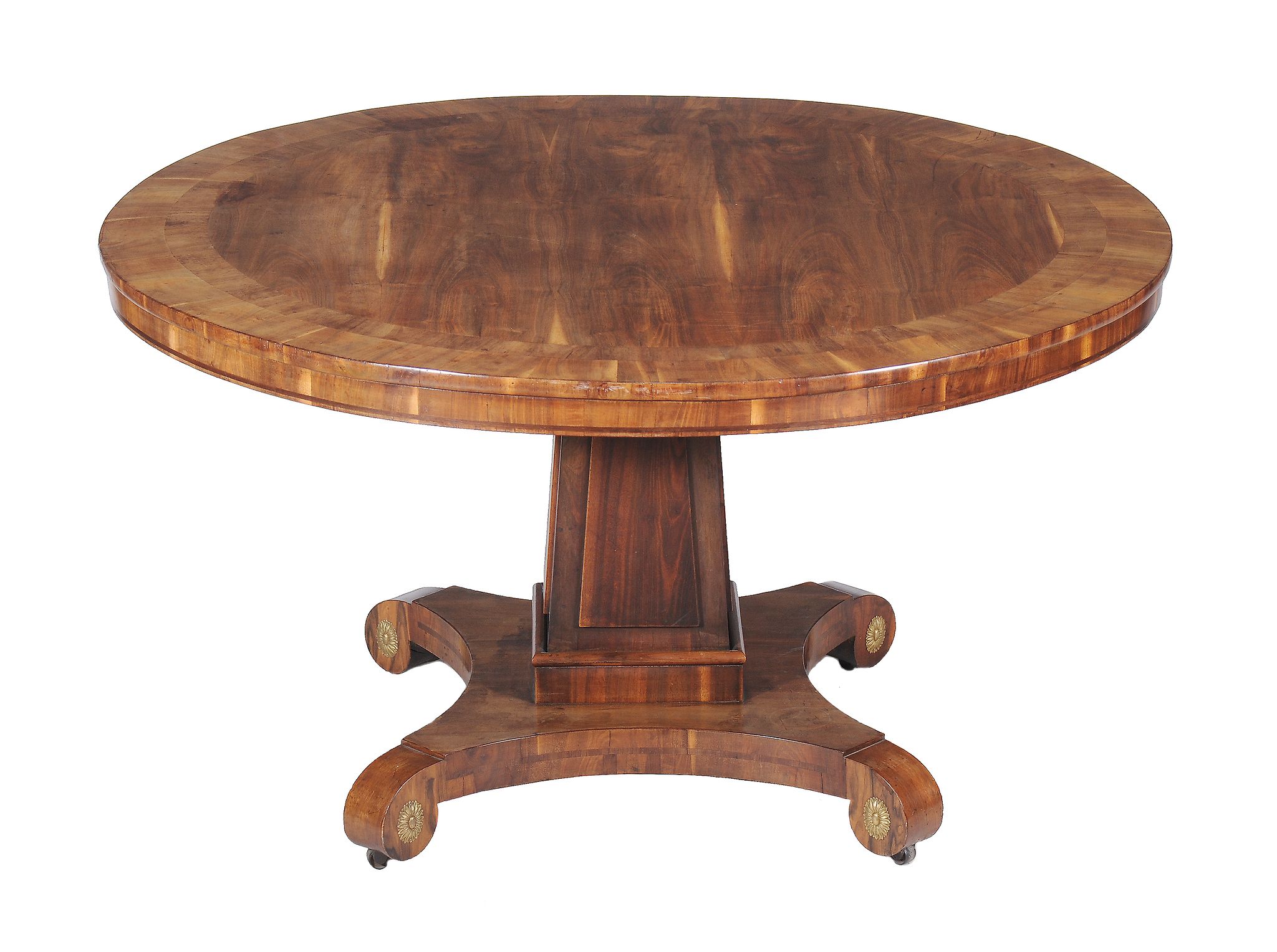 Ω A Victorian goncalo alves centre table , circa 1860, the circular top with mahogany and rosewood