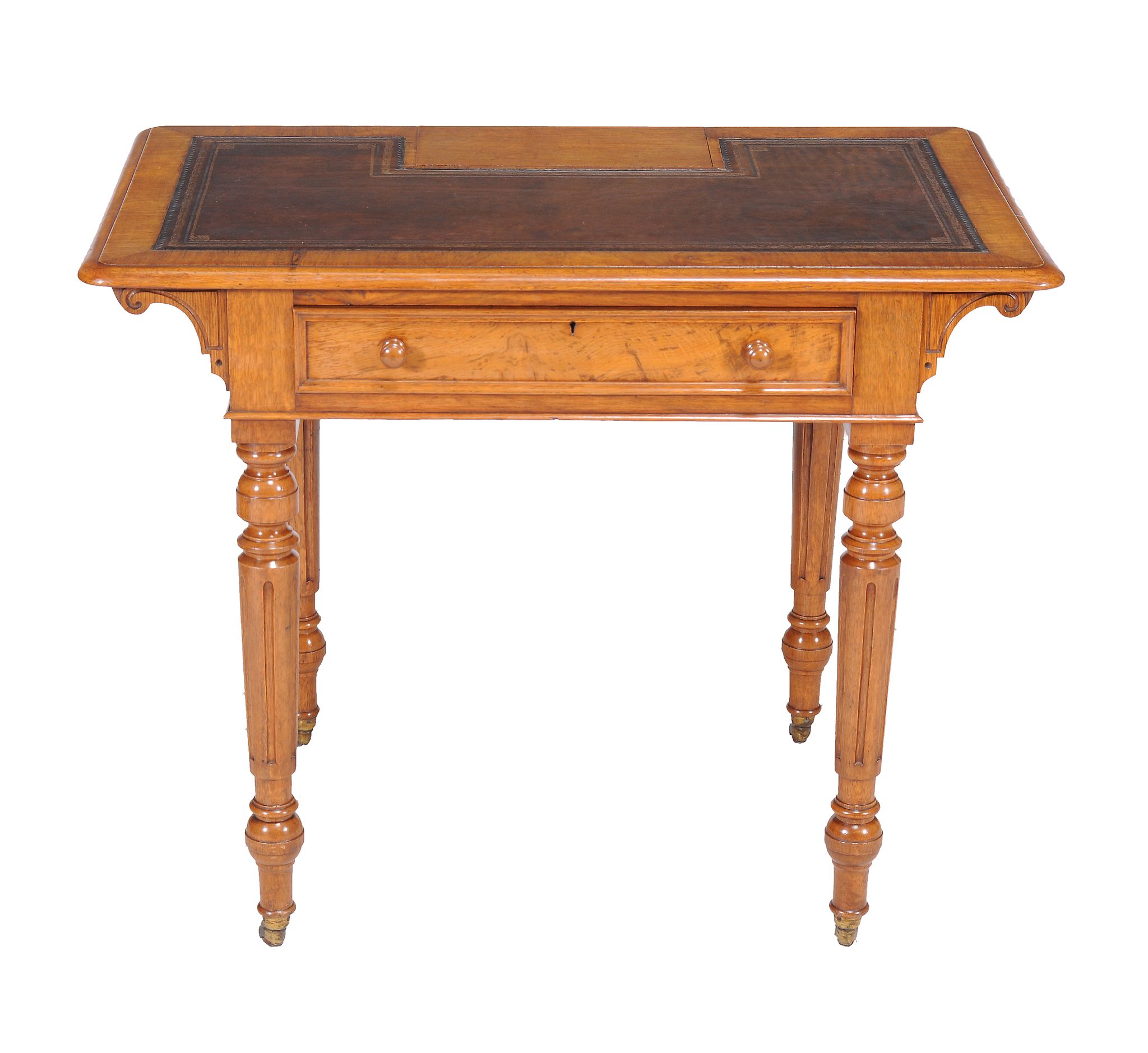 A Victorian oak writing table , circa 1880, in the manner of Gillows, the leather inset top with