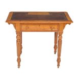 A Victorian oak writing table , circa 1880, in the manner of Gillows, the leather inset top with